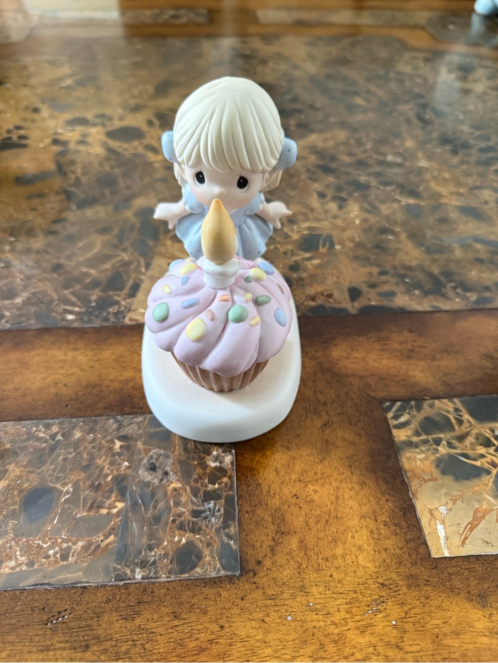 Precious Moments Figurine with Pastel Pink Cupcake and Blue Outfit